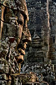 Angkor Thom - Bayon temple, second enclosure, corner towers seen from the central terrace 